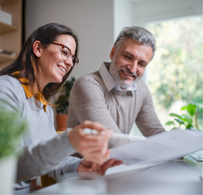 people at home with paper